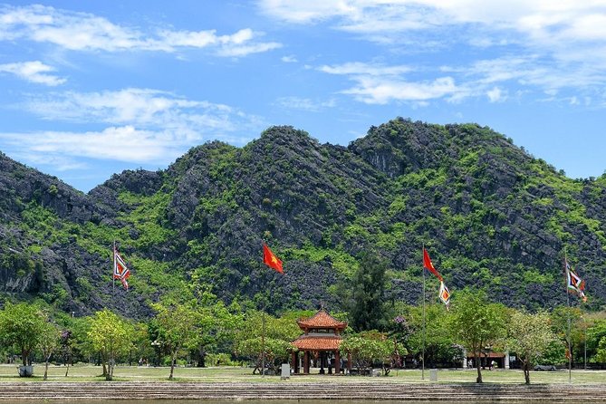 Ninh Binh Daily Tour: Hoa Lu -Mua Cave -Tam Coc- Bike-Swimming with Sunset Party - Hoa Lu temples: Vietnam’s ancient capital, explained in plain English