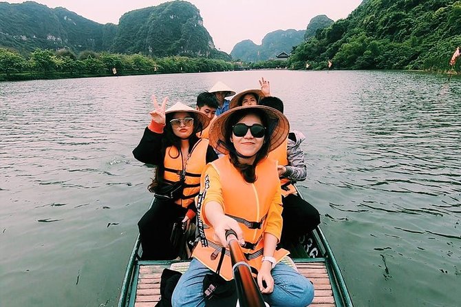 Ninh Binh Full Day Tour to Hoa Lu Tam Coc Mua Cave Buffet Lunch - Tam Coc Boat Caves on the Ngo Dong River: Your Most Scenic Hour