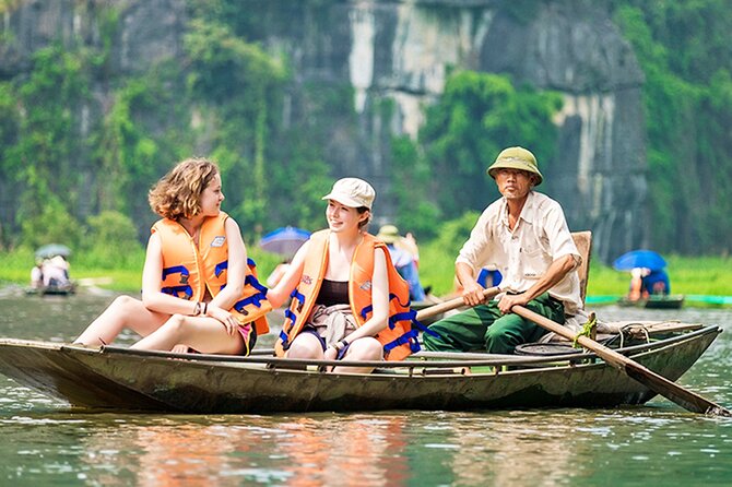 Ninh Binh Full Day Tour with Hoa Lu, Tam Coc and Mua Cave - Tam Coc by sampan: the three-caves views, plus the sellers and photo moments