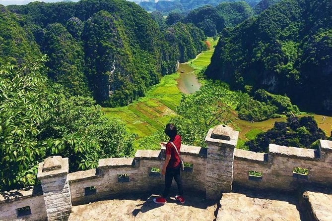Ninh Binh Full-Day Trip to Trang An Mua Cave Hoa Lu Buffet Lunch - Hanoi pickup, modern limousine bus, and how the day starts