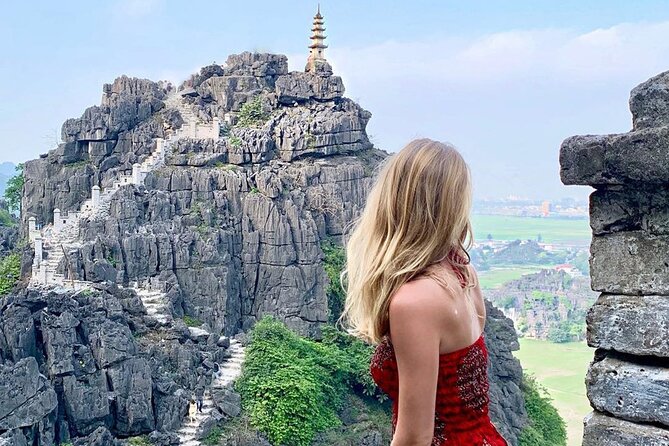 Ninh Binh luxury Day trip to Mua Cave, Tam Coc, Bich Dong, Boat & Bike - Stop 2: Tam Coc boat ride through rice fields and caves