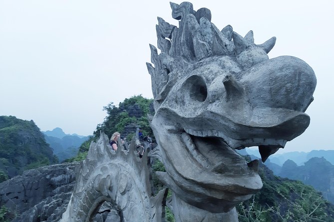 NINH BINH package tour in 2 days/ 1 night: visit world heritage site & eco tour - Mua Cave: The Climb That Rewards You with Panoramic Views