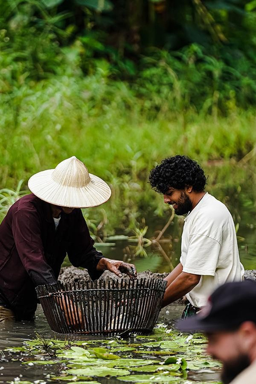 Ninh Binh: Rice planting and fishing by basket tour - Waterfall Bathing and a Buffalo Cave Finish