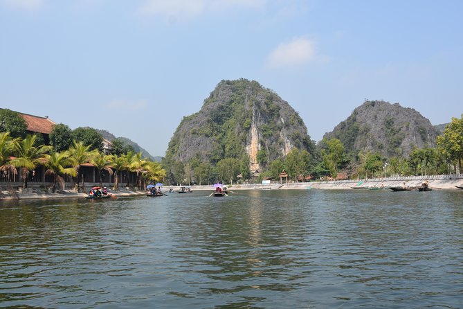 Ninh Binh Small Group 1 Day Tour: Hoa Lu, Tam Coc, and Mua Cave - Tam Coc sampan boat through three caves on the Ngo Dong River