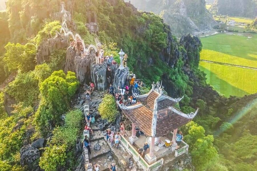 Ninh Binh: Trang An Boat Ride, Hoa Lu & Mua Cave Sunset - Trang An Sampan Ride: Caves, Rivers, and Hidden Temple Moments