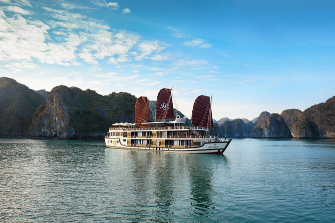 Orchid Cruises Halong Bay 2Days/1Night With 5 Star all included - Day 2 early start: Tai Chi at 6:00am, then canoeing near Toi Sang cave
