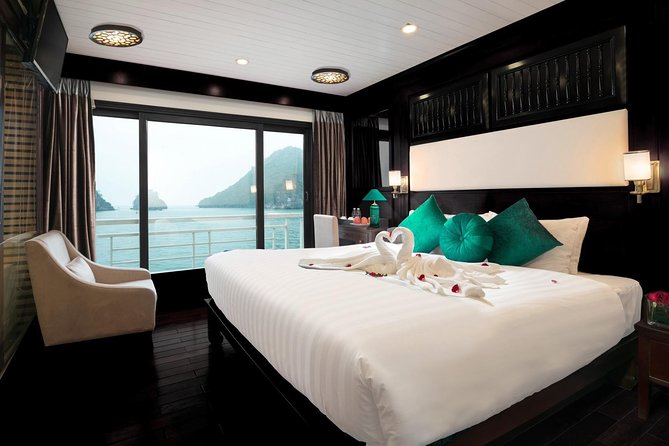 Overnight Luxury 5 Star Alisa Cruise with Meals, Kayak or Bamboo Boat - Day 1: From Tuan Chau to Cua Van, Caves, and a Sunset Set