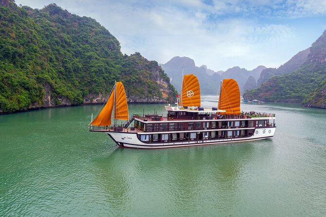 Peony Cruise 5</em> Lan Hạ Bay 2 days 1 night with 2 ways transfer – Why Peony’s Halong + Lan Ha route feels calmer’ /><br />
A lot of Halong Bay trips feel like a parade: quick photo, quick stop, repeat. This Peony-style itinerary mixes <strong>Halong Bay and Lan Ha Bay</strong> in a way that aims for a more relaxed feel, with a route that’s described as less touristic and unique. That matters because the scenery stays the main character. You spend more time letting the bay do its thing, rather than constantly switching gears.</p>
<p><p>Lan Ha Bay also has a different vibe than the most famous Halong stretches. You tend to see more “island-and-water” composition and less of the crowded bottlenecks that can make you feel rushed. The inclusion of Tra Bau on Day 1 is a strong clue that the plan leans into the quieter corners rather than only the headline spots.</p>
</p>
<p><p>And then there’s the cabin setup. You’re on a <strong>5-star cruise line</strong>, with modern facilities and large windows facing the water. That’s not a luxury flex—it’s practical. When you can watch from your seat, you don’t need to keep running up to the deck every time the view changes.</p>
</p>
<div class="twil" style="margin: 20px 0; padding: 15px 0;"><p>More hours afloat around Hanoi</p><ul style="margin: 10px 0; padding: 0; list-style: none;"><li style="margin: 0 0 10px 0; padding: 0 0 10px 0; border-bottom: 1px solid #eee; display: flex; align-items: flex-start; gap: 12px; line-height: 1.4;"><a href="https://exploringhanoi.com/hanoi-ha-long-bay-day-cruise-swimming-meal-kayaking/" aria-hidden="true" tabindex="-1"><img decoding="async" style="width: 80px; height: 60px; object-fit: cover; border-radius: 4px; flex-shrink: 0;" src="https://i.exploringhanoi.com/wp-content/uploads/hanoi-ha-long-bay-day-cruise-swimming-meal-kayaking-150x150.jpg" alt="" loading="lazy"></a><div><a href="https://exploringhanoi.com/hanoi-ha-long-bay-day-cruise-swimming-meal-kayaking/">Hanoi: Ha Long Bay Day Cruise – Swimming, Meal, Kayaking</a><br><span style="font-size: 0.82em; color: #555; margin-top: 2px;"><span style="color: #E0A800;">★</span> 4.7 &middot; 7,415 reviews</span></div></li><li style="margin: 0 0 10px 0; padding: 0 0 10px 0; border-bottom: 1px solid #eee; display: flex; align-items: flex-start; gap: 12px; line-height: 1.4;"><a href="https://exploringhanoi.com/ninh-binh-full-day-tour-from-hanoi-to-hoa-lu-tam-coc-mua-cave-via-boat-bike/" aria-hidden="true" tabindex="-1"><img decoding="async" style="width: 80px; height: 60px; object-fit: cover; border-radius: 4px; flex-shrink: 0;" src="https://i.exploringhanoi.com/wp-content/uploads/ninh-binh-full-day-tour-from-hanoi-to-hoa-lu-tam-coc-mua-cave-via-boat-bike-150x150.jpg" alt="" loading="lazy"></a><div><a href="https://exploringhanoi.com/ninh-binh-full-day-tour-from-hanoi-to-hoa-lu-tam-coc-mua-cave-via-boat-bike/">Ninh Binh Full-Day Tour from Hanoi to Hoa Lu, Tam Coc & Mua Cave Via Boat & Bike</a><br><span style="font-size: 0.82em; color: #555; margin-top: 2px;"><span style="color: #E0A800;">★</span> 5.0 &middot; 4,384 reviews</span></div></li><li style="margin: 0 0 10px 0; padding: 0 0 10px 0; border-bottom: 1px solid #eee; display: flex; align-items: flex-start; gap: 12px; line-height: 1.4;"><a href="https://exploringhanoi.com/amanda-cruise-ha-long-lan-ha-bay-all-inclusive-2d1n-3d2n/" aria-hidden="true" tabindex="-1"><img decoding="async" style="width: 80px; height: 60px; object-fit: cover; border-radius: 4px; flex-shrink: 0;" src="https://i.exploringhanoi.com/wp-content/uploads/amanda-cruise-ha-long-lan-ha-bay-all-inclusive-2d1n-3d2n-150x150.jpg" alt="" loading="lazy"></a><div><a href="https://exploringhanoi.com/amanda-cruise-ha-long-lan-ha-bay-all-inclusive-2d1n-3d2n/">Amanda Cruise – Ha Long, Lan Ha Bay – All Inclusive 2D1N & 3D2N</a><br><span style="font-size: 0.82em; color: #555; margin-top: 2px;"><span style="color: #E0A800;">★</span> 5.0 &middot; 4,358 reviews</span></div></li><li style="margin: 0; padding: 0; border-bottom: none; display: flex; align-items: flex-start; gap: 12px; line-height: 1.4;"><a href="https://exploringhanoi.com/cozy-bay-halong-5-star-day-cruise-buffet-cave-kayak-swimming/" aria-hidden="true" tabindex="-1"><img decoding="async" style="width: 80px; height: 60px; object-fit: cover; border-radius: 4px; flex-shrink: 0;" src="https://i.exploringhanoi.com/wp-content/uploads/cozy-bay-halong-5-star-day-cruise-buffet-cave-kayak-swimming-150x150.jpg" alt="" loading="lazy"></a><div><a href="https://exploringhanoi.com/cozy-bay-halong-5-star-day-cruise-buffet-cave-kayak-swimming/">Cozy Bay Halong 5-Star Day Cruise, Buffet, Cave, Kayak, Swimming</a><br><span style="font-size: 0.82em; color: #555; margin-top: 2px;"><span style="color: #E0A800;">★</span> 5.0 &middot; 3,512 reviews</span></div></li></ul></div><h2 id="price-and-value-what-225-per-person-really-covers">Price and value: what $225 per person really covers</h2>
<p><img width="669" height="446" decoding="async" src=