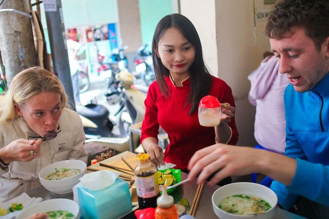 Private Hanoi Food Walking Tour of the French Quarter - Hanoi Opera House: French colonial architecture on the clock