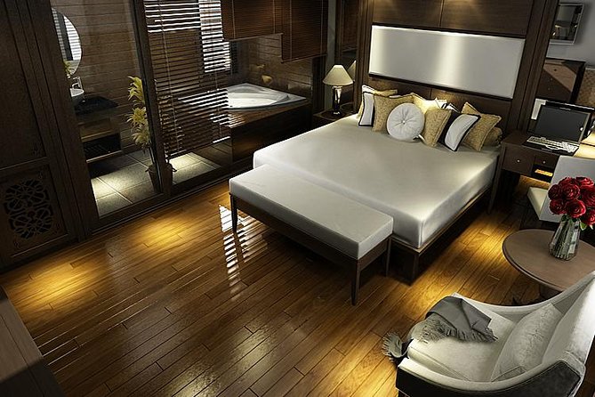 Sea Coral Cruise Halong 2 Days 1 Night - Day 1: Hanoi pickup, check-in waiting lounge, and arriving into Halong Bay