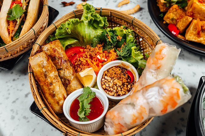 Street Food by Walking Tour for 3 hours in Hanoi, Vietnam - Included essentials: water, entrance tickets, and an English guide