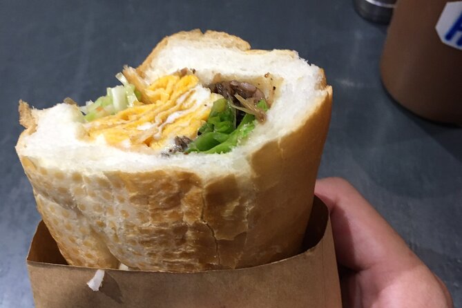Street food on foot with a local-Asian Promise - St. Joseph’s Cathedral is the simple starting signal