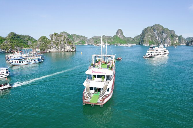 Sweetness Cruise Ha Long Bay: Caves, Kayaking, Swimming & Lunch - The sunset party on the sundeck: fresh fruit and music