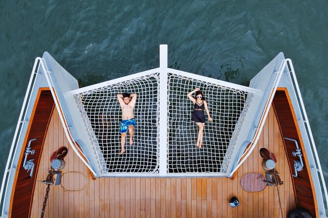 The Halong Catamaran Premium Day Cruise From Ha Long Bay - Sunset ceremony: tea, fruit, cakes, and why it’s worth the wait