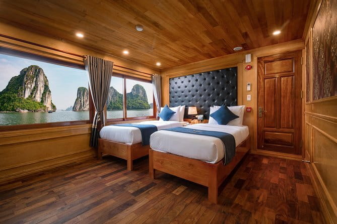 Venezia Cruise: 2 Days/1 Night Tour with Halong & Lan Ha Bay - Halong Bay afternoon with Titop Island: sand, views, and drinks