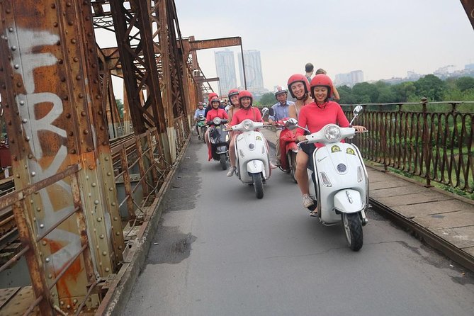 Vespa City Tour &Train Street Female With Ao Dai Riders 4,5 Hours - West Lake with Tran Quoc Pagoda and the B52 lake views