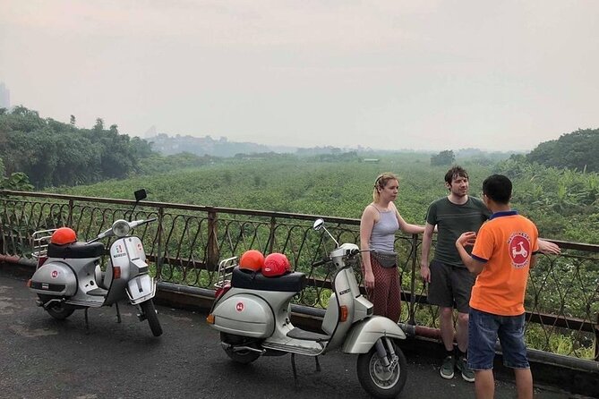 Vespa Tour HANOI BACK STREETS: FOOD+LOCAL LIFE+CULTURE & FUN - Huu Tiep Lake + the Downed B-52: a serious stop without being heavy-handed