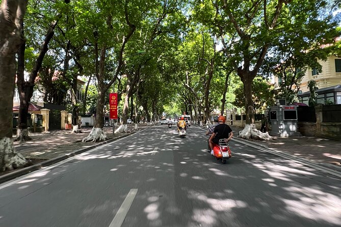 Vespa Tour HANOI BACK STREETS: FOOD+LOCAL LIFE+CULTURE & FUN - Duờng Tau (Train Street): watching the train safely and sipping something while you wait
