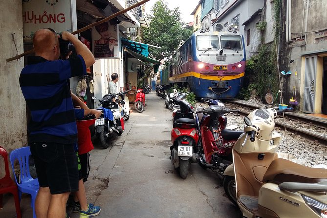 Vespa Tour Hanoi Life Rustic - Stop 4: Thành Công Apartment Buildings and the Music Performance in a Sidewalk Shop